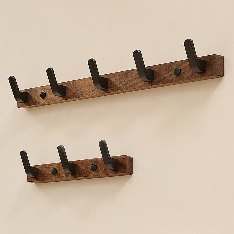 Vrana - Eleganter Schwarzen Garderobenhaken aus Holz und Metall für stilvolle Wandmontage - Givera DE